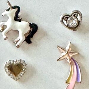 Small stud Betsy Johnson stud earrings set of 4.